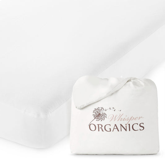 Whisper organics GOTS certified white organic cotton pique knit crib mattress cover laid across bed with branded reusable packaging on the side