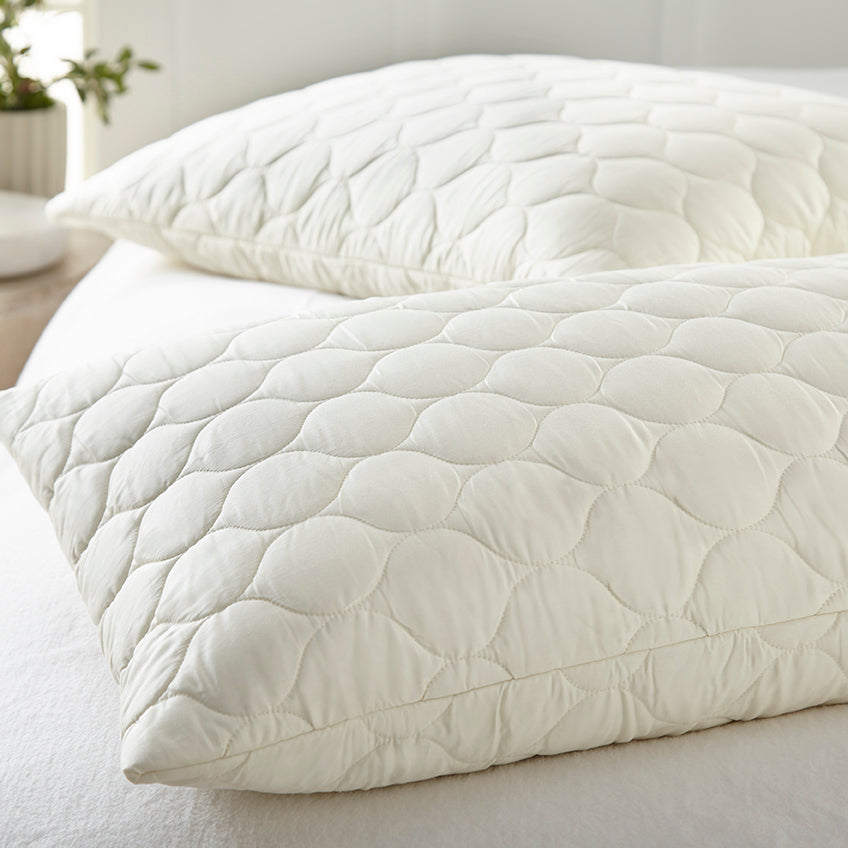 Organic cotton quilted pillow protector.
