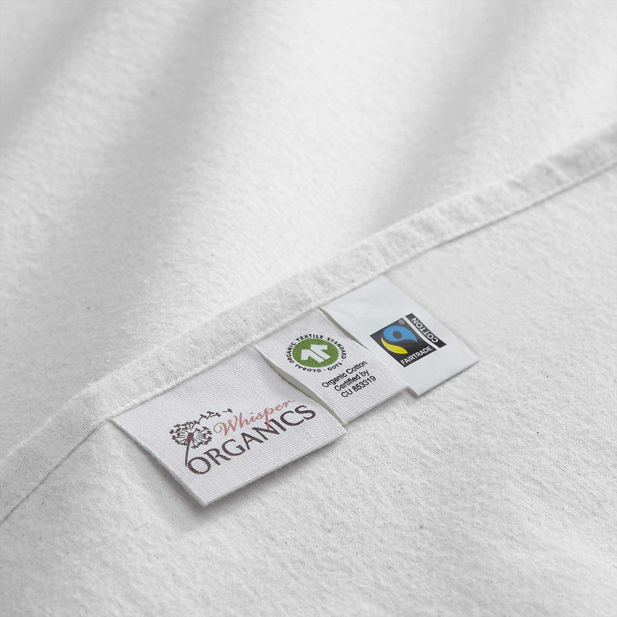 Organic flannel sheet set with Whisper Organics, GOTS, and Fairtrade labels.