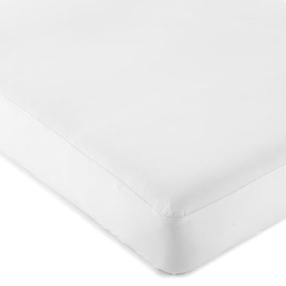 White organic cotton waterproof mattress cover on bed with smooth jersey knit surface